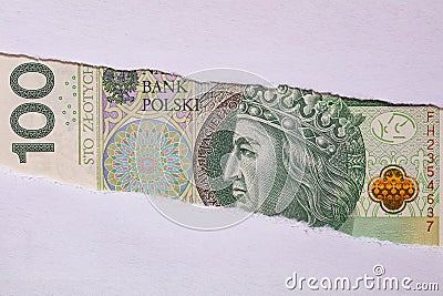 Polish 100 ZÅ‚otych banknote in torn paper hole Stock Photo